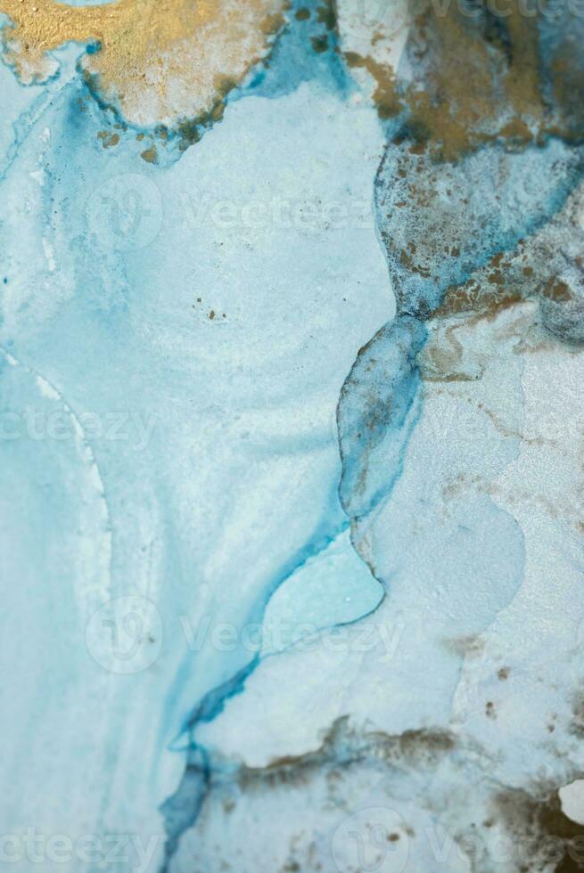 Alcohol ink sea texture. Artistic bright splash. Liquid artwork. Abstract ethereal swirl. Fragment of artwork. Trendy modern art. Inspired by the sky, as well as steam and smoke. photo