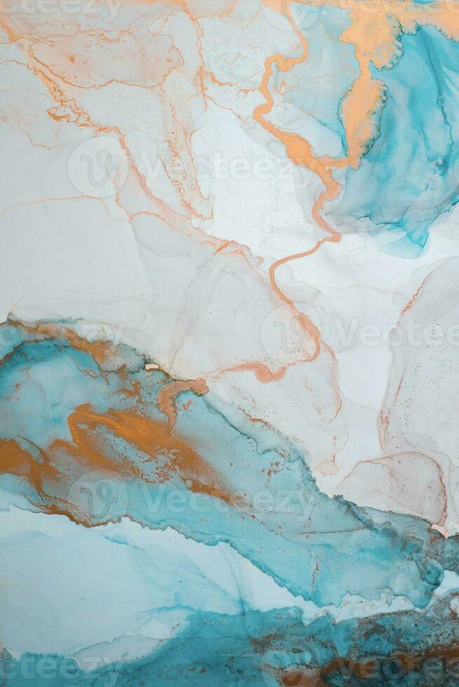 The picture is painted in alcohol ink. Creative abstract artwork made with translucent ink colors. Trendy wallpaper. Abstract painting, can be used as a background for wallpapers, posters, websites. photo