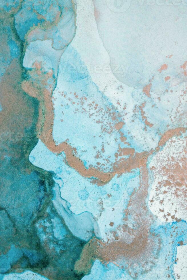The picture is painted in alcohol ink. Creative abstract artwork made with translucent ink colors. Trendy wallpaper. Abstract painting, can be used as a background for wallpapers, posters, websites. photo