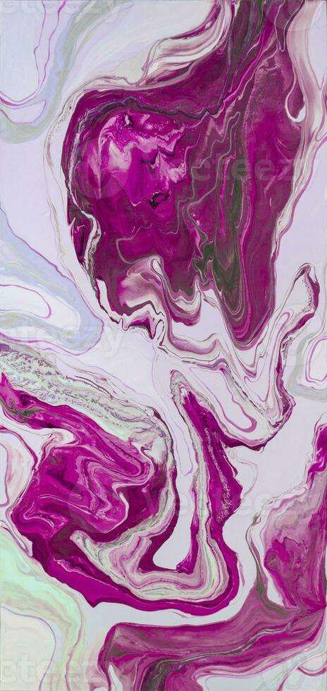 Abstract created using the technique of liquid acrylic. Macro photography of the smallest details of a picture. The picture shows how overflows of shades and colors of paint resemble space motifs. photo