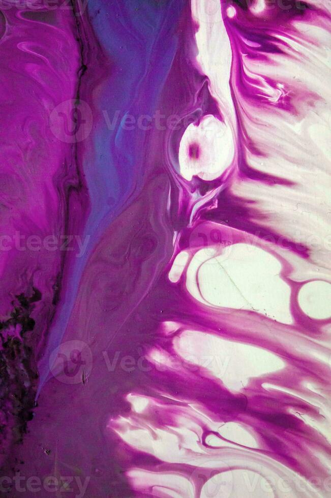 Abstract created using the technique of liquid acrylic. Purple marble texture. Abstract ethereal swirl. Trendy wallpaper. Natural pattern, luxury. Art for your design project. Transparent creativity. photo