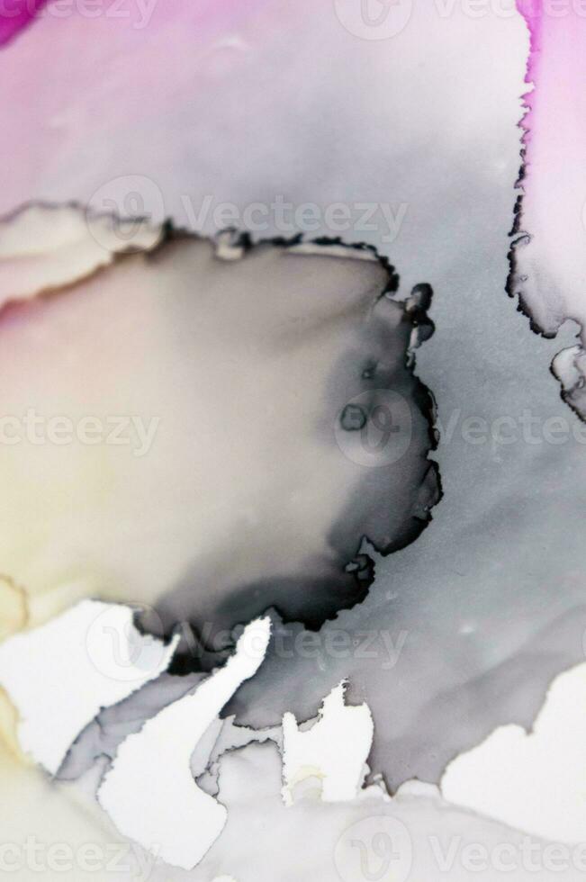 The picture is painted in alcohol ink. Creative abstract artwork made with translucent ink colors. Trendy wallpaper. Abstract painting, can be used as a background for wallpapers, posters, websites. photo
