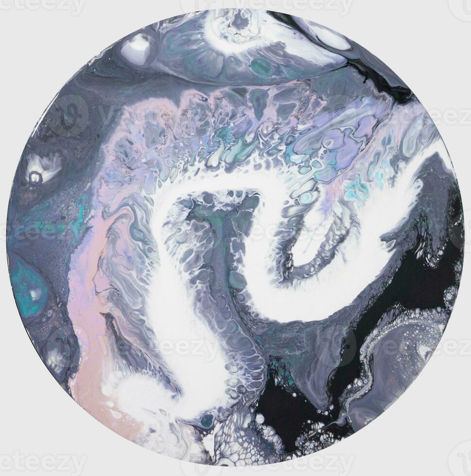 Abstract created using the technique of liquid acrylic. Macro photography of the smallest details of a picture. The picture shows how overflows of shades and colors of paint resemble space motifs. photo