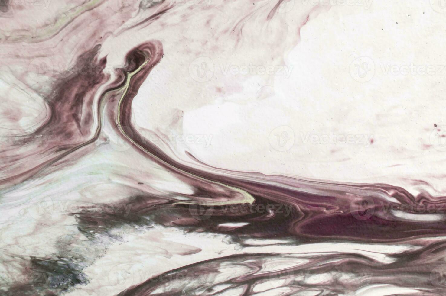 Abstract created using the technique of liquid acrylic. Macro photography of the smallest details of a picture. The picture shows how overflows of shades and colors of paint resemble space motifs. photo