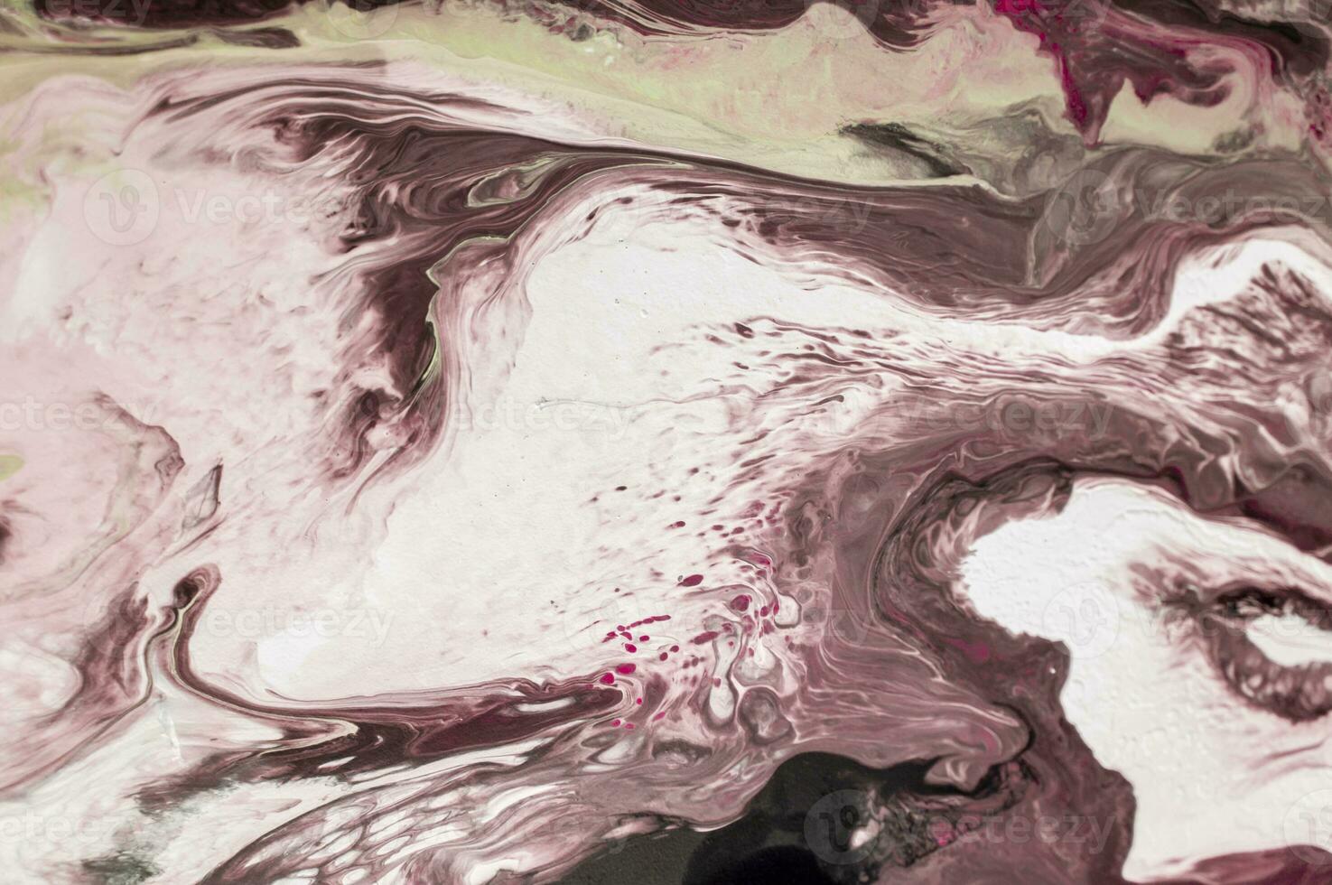 Abstract created using the technique of liquid acrylic. Macro photography of the smallest details of a picture. The picture shows how overflows of shades and colors of paint resemble space motifs. photo