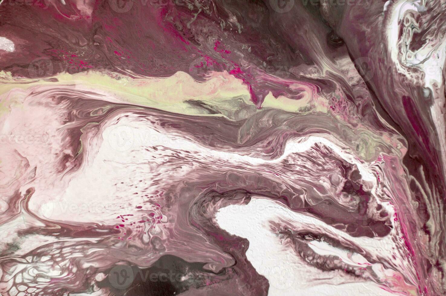 Abstract created using the technique of liquid acrylic. Macro photography of the smallest details of a picture. The picture shows how overflows of shades and colors of paint resemble space motifs. photo