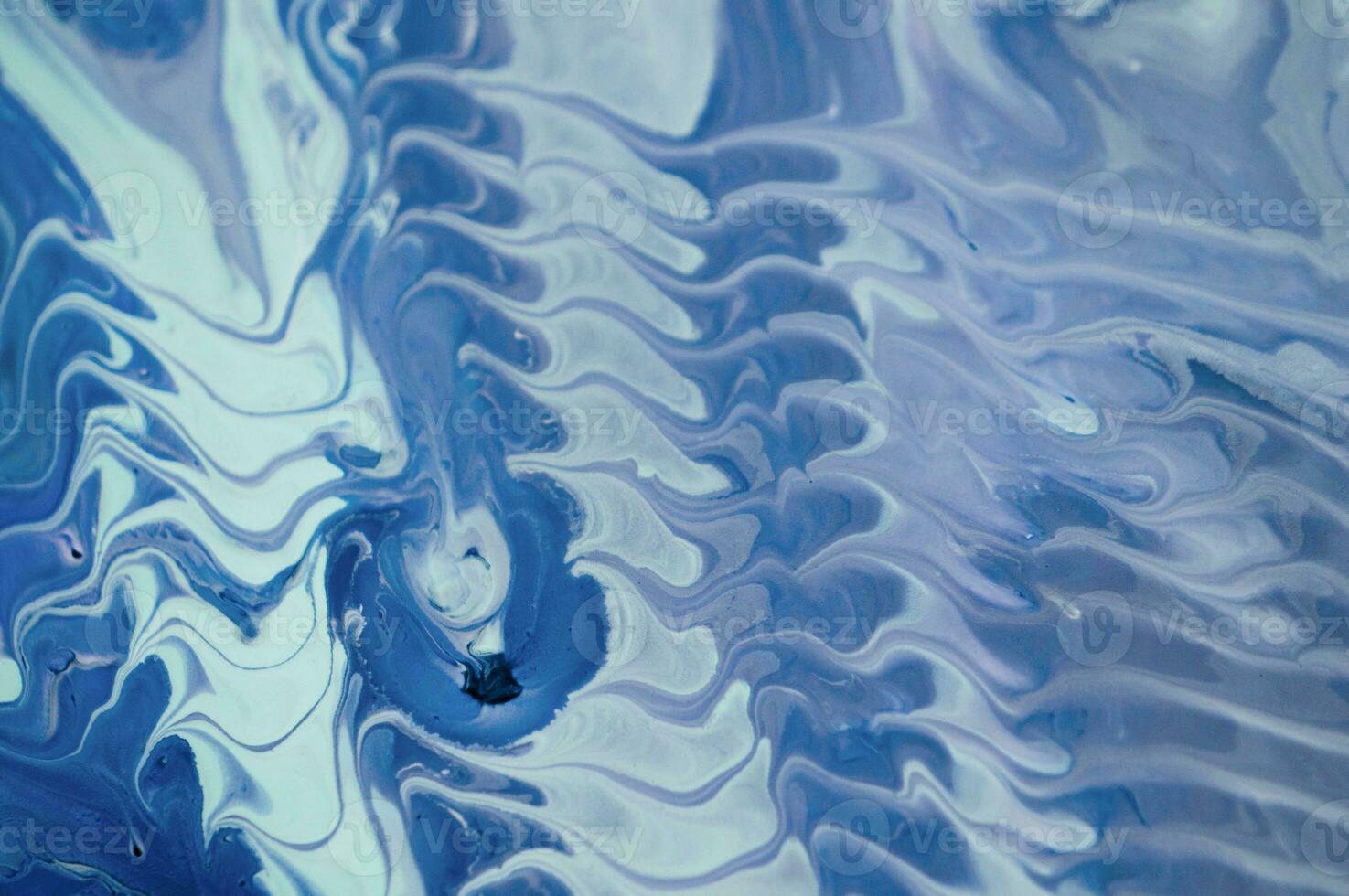 Abstract fluid acrylic painting. Marbled blue abstract background. Liquid marble pattern. Hand painted background with mixed liquid red, blue and green paints. Modern art. photo