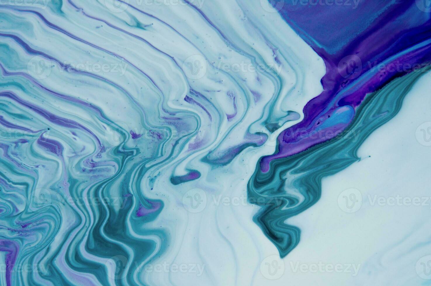Abstract fluid acrylic painting. Marbled blue abstract background. Liquid marble pattern. Hand painted background with mixed liquid red, blue and green paints. Modern art. photo