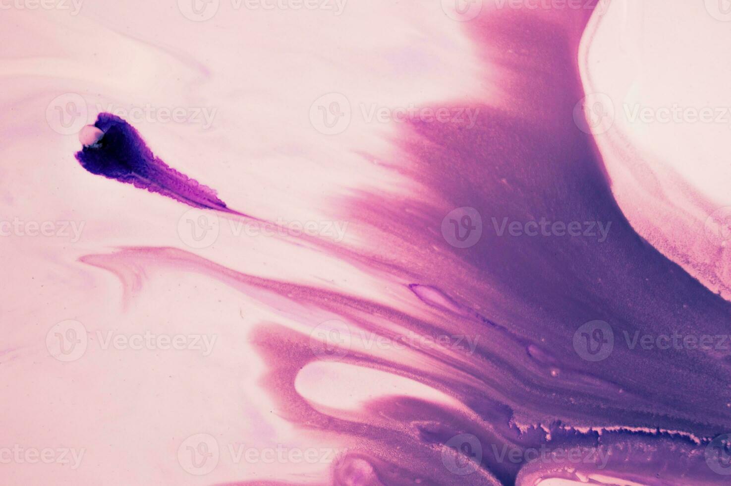 Abstract created using the technique of liquid acrylic. Macro photography of the smallest details of a panting. The panting shows how overflows of shades and colors of paint resemble space motifs. photo