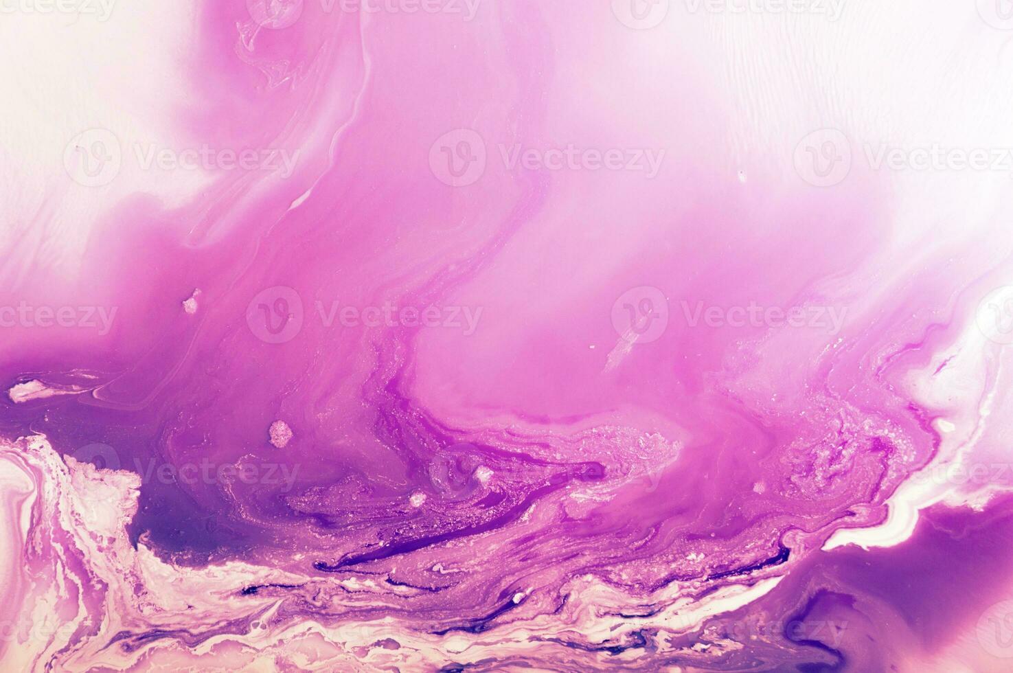 Abstract created using the technique of liquid acrylic. Macro photography of the smallest details of a panting. The panting shows how overflows of shades and colors of paint resemble space motifs. photo
