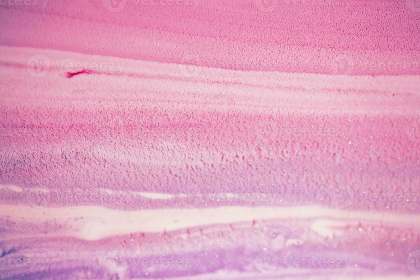 Abstract created using the technique of liquid acrylic. Macro photography of the smallest details of a picture. The picture shows how overflows of shades and colors of paint resemble space motifs. photo