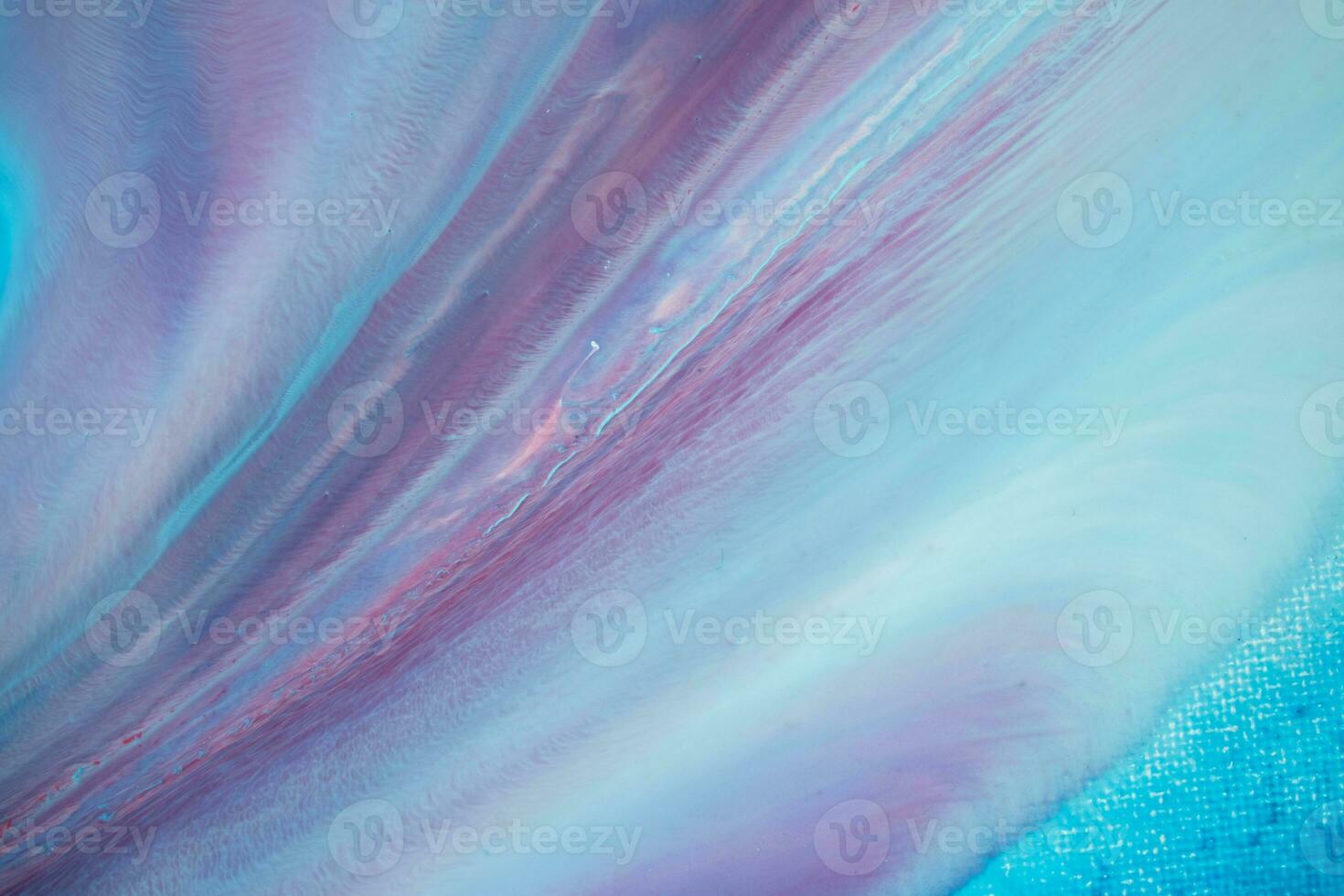 Abstract created using the technique of liquid acrylic. Macro photography of the smallest details of a panting. The panting shows how overflows of shades and colors of paint resemble space motifs. photo