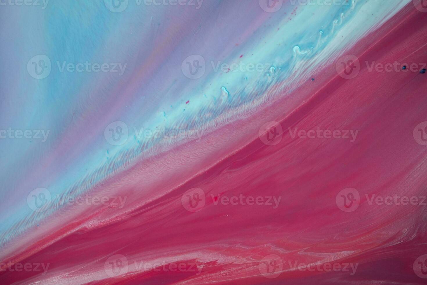Abstract created using the technique of liquid acrylic. Macro photography of the smallest details of a panting. The panting shows how overflows of shades and colors of paint resemble space motifs. photo