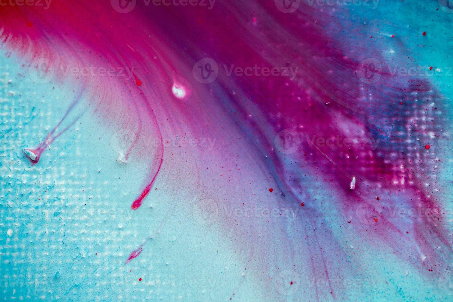 Abstract created using the technique of liquid acrylic. Macro photography of the smallest details of a panting. The panting shows how overflows of shades and colors of paint resemble space motifs. photo