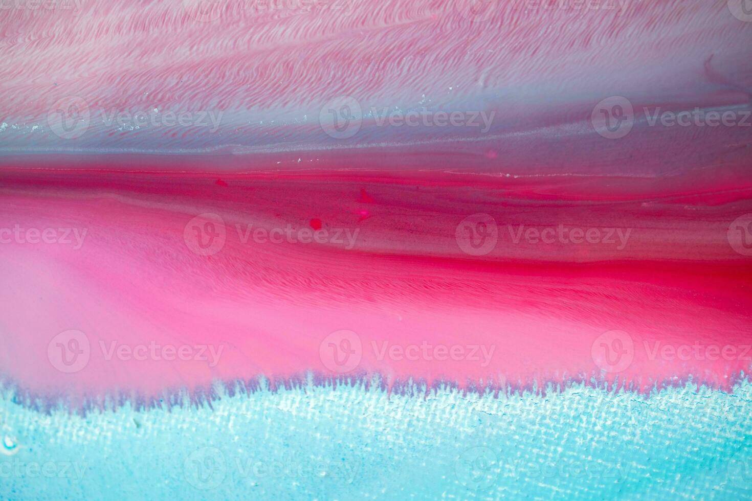 Abstract created using the technique of liquid acrylic. Macro photography of the smallest details of a panting. The panting shows how overflows of shades and colors of paint resemble space motifs. photo