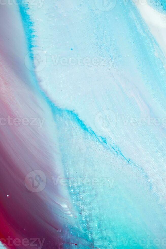 Abstract created using the technique of liquid acrylic. Macro photography of the smallest details of a panting. The panting shows how overflows of shades and colors of paint resemble space motifs. photo