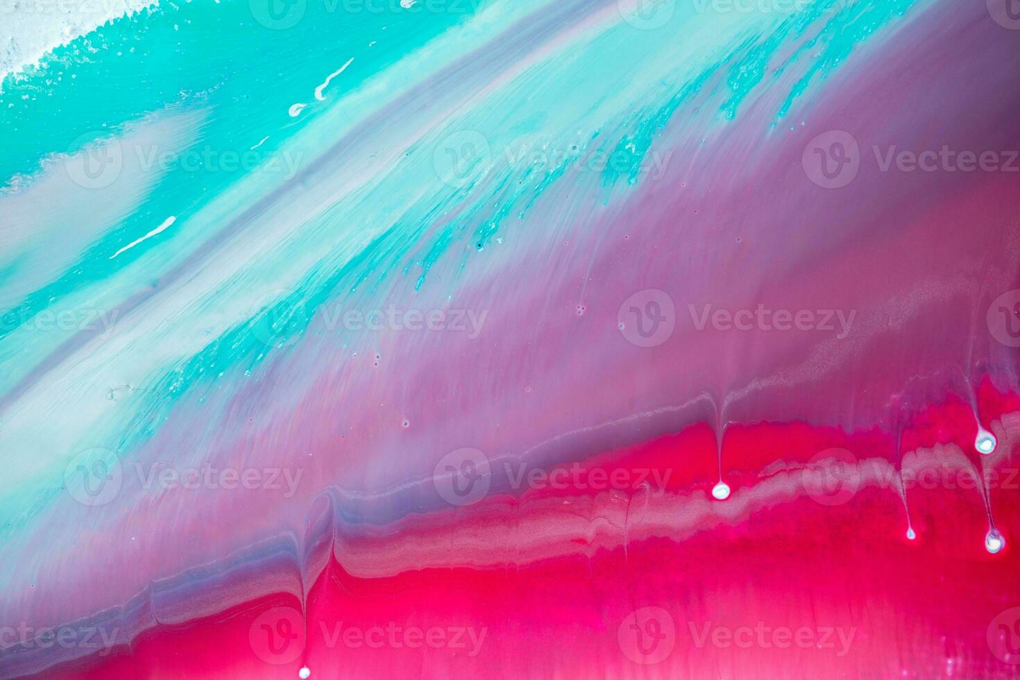 Abstract created using the technique of liquid acrylic. Macro photography of the smallest details of a panting. The panting shows how overflows of shades and colors of paint resemble space motifs. photo