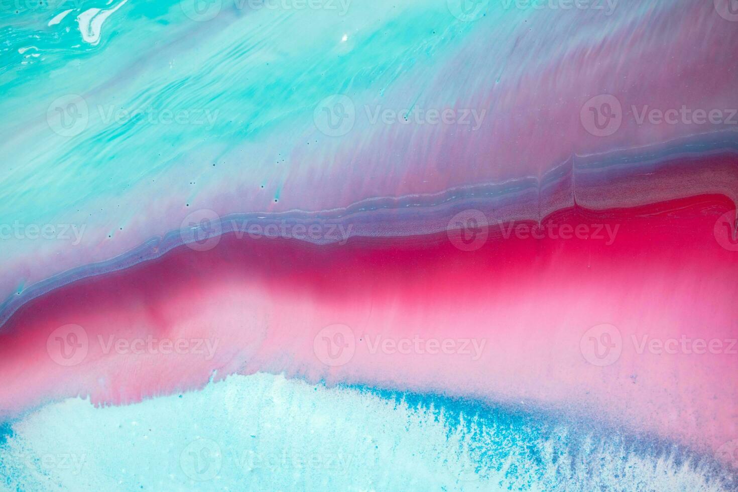 Abstract created using the technique of liquid acrylic. Macro photography of the smallest details of a panting. The panting shows how overflows of shades and colors of paint resemble space motifs. photo