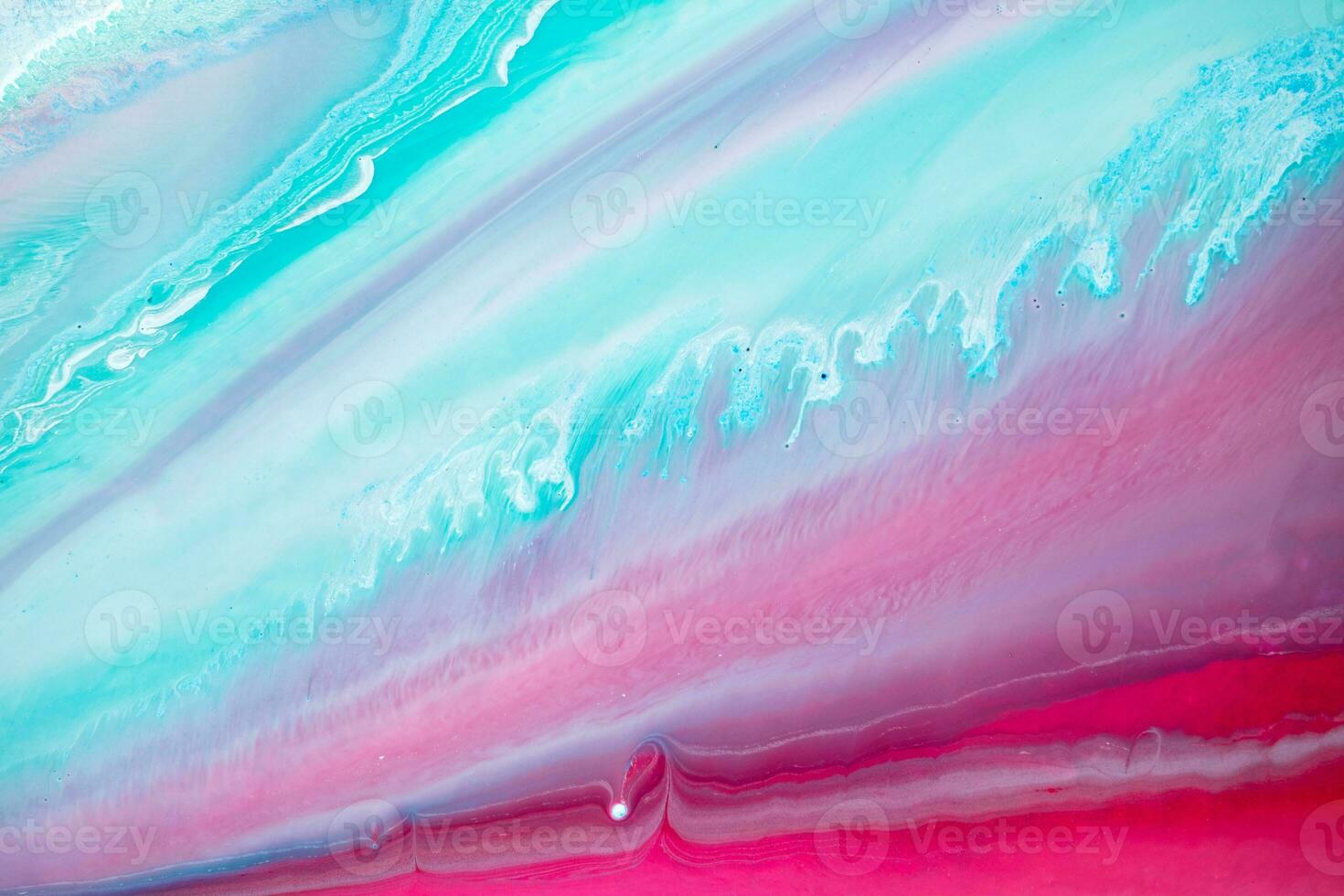 Abstract created using the technique of liquid acrylic. Macro photography of the smallest details of a panting. The panting shows how overflows of shades and colors of paint resemble space motifs. photo