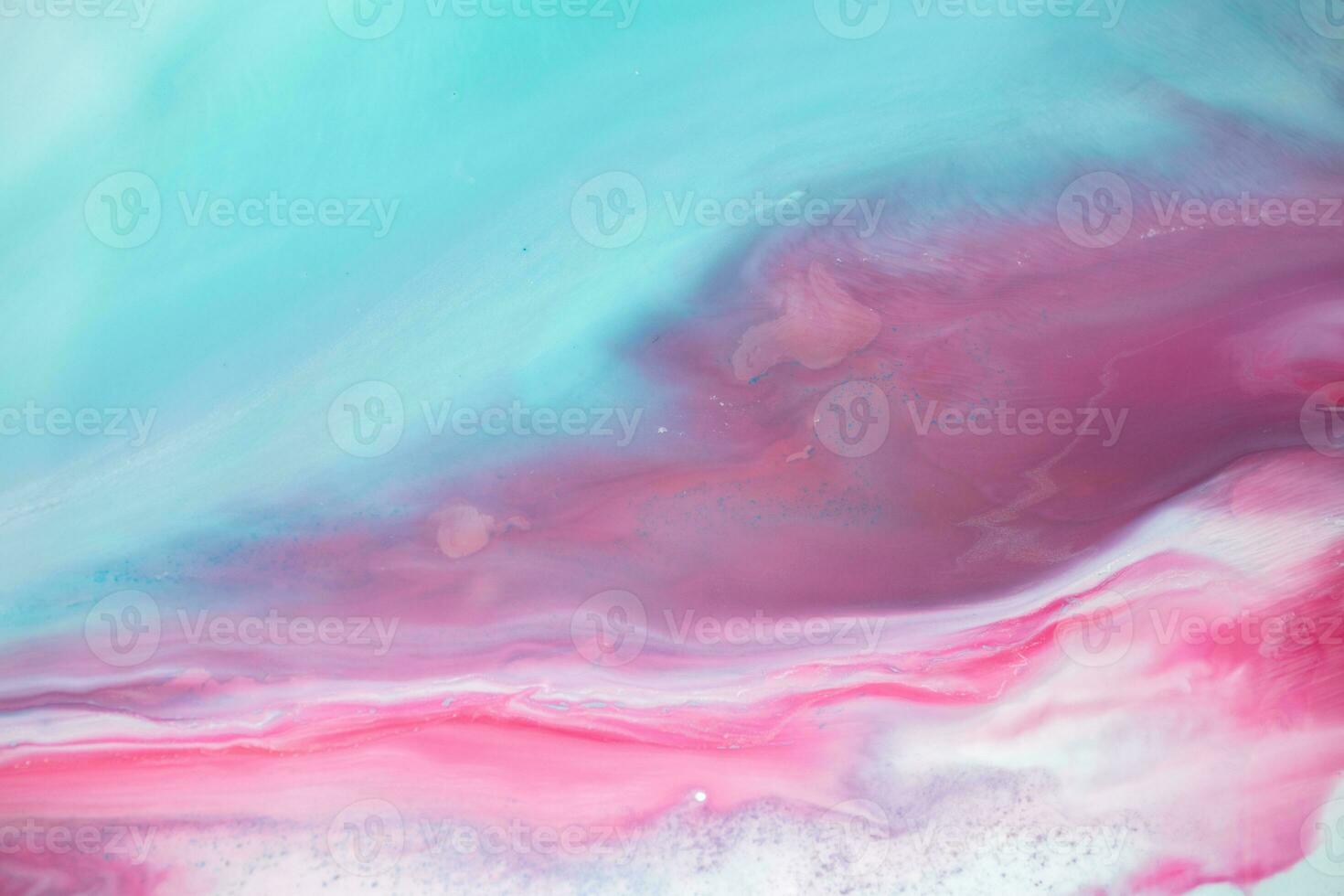Abstract created using the technique of liquid acrylic. Macro photography of the smallest details of a panting. The panting shows how overflows of shades and colors of paint resemble space motifs. photo