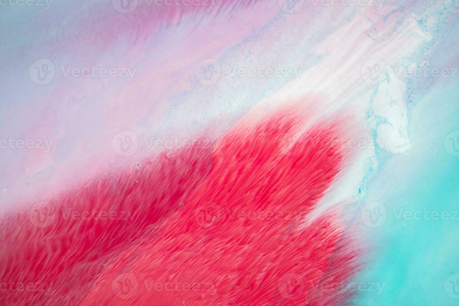 Abstract created using the technique of liquid acrylic. Macro photography of the smallest details of a panting. The panting shows how overflows of shades and colors of paint resemble space motifs. photo