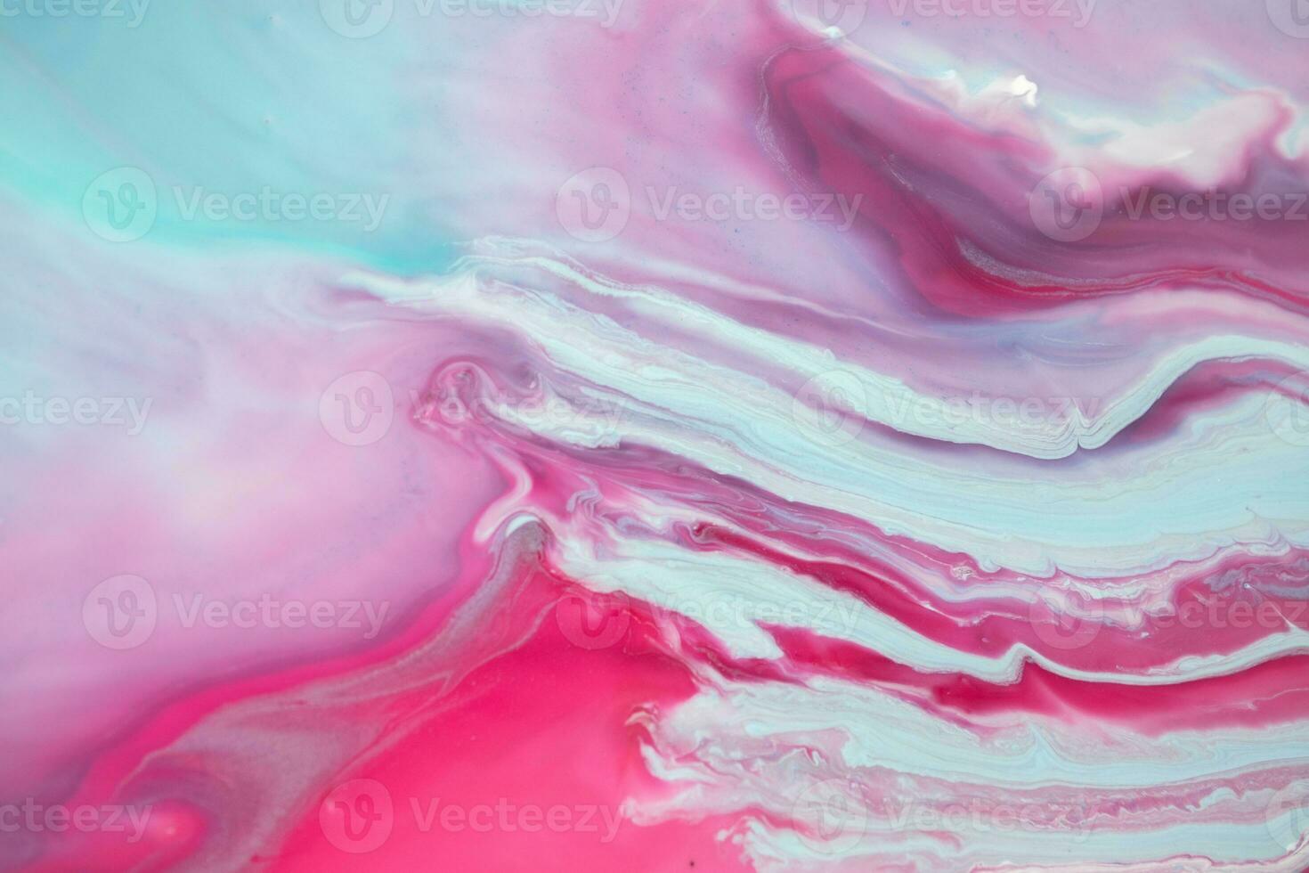 Abstract created using the technique of liquid acrylic. Macro photography of the smallest details of a panting. The panting shows how overflows of shades and colors of paint resemble space motifs. photo