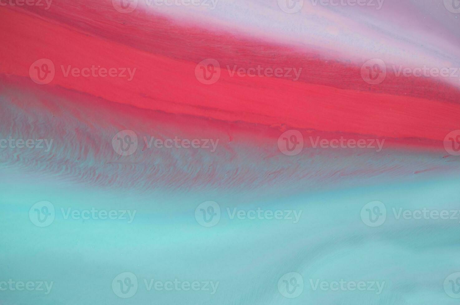 Abstract created using the technique of liquid acrylic. Macro photography of the smallest details of a panting. The panting shows how overflows of shades and colors of paint resemble space motifs. photo