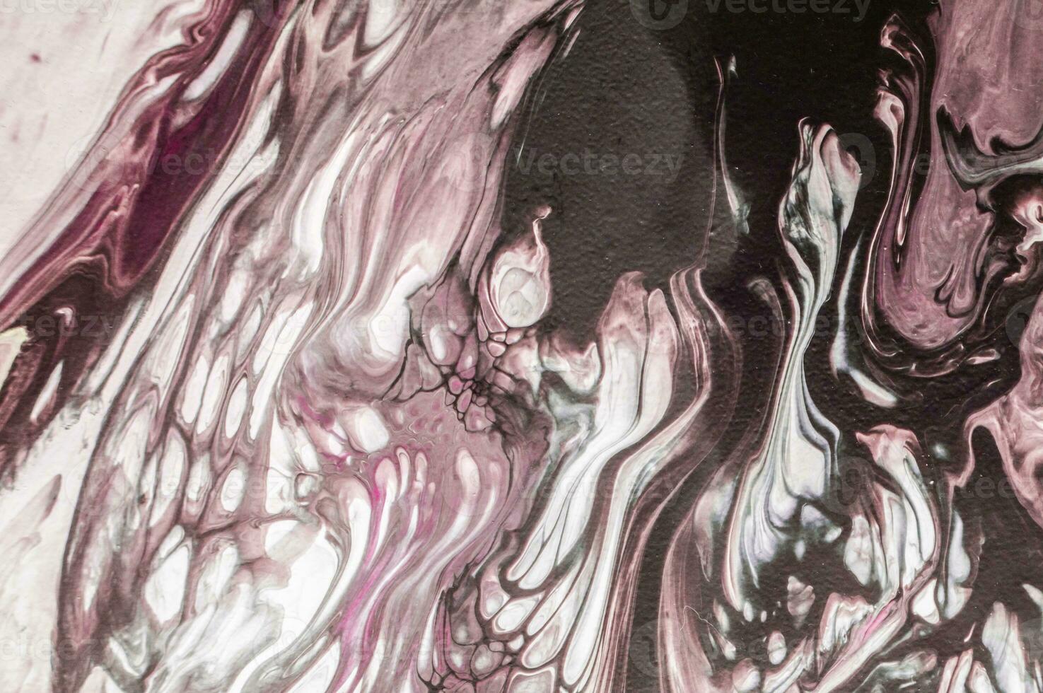 Abstract created using the technique of liquid acrylic. Macro photography of the smallest details of a picture. The picture shows how overflows of shades and colors of paint resemble space motifs. photo