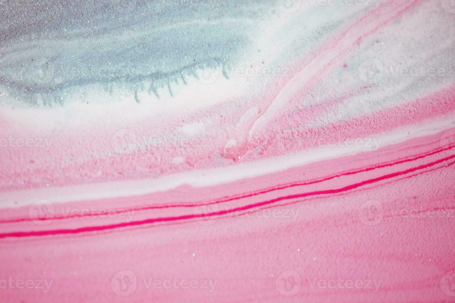 Abstract created using the technique of liquid acrylic. Macro photography of the smallest details of a picture. The picture shows how overflows of shades and colors of paint resemble space motifs. photo