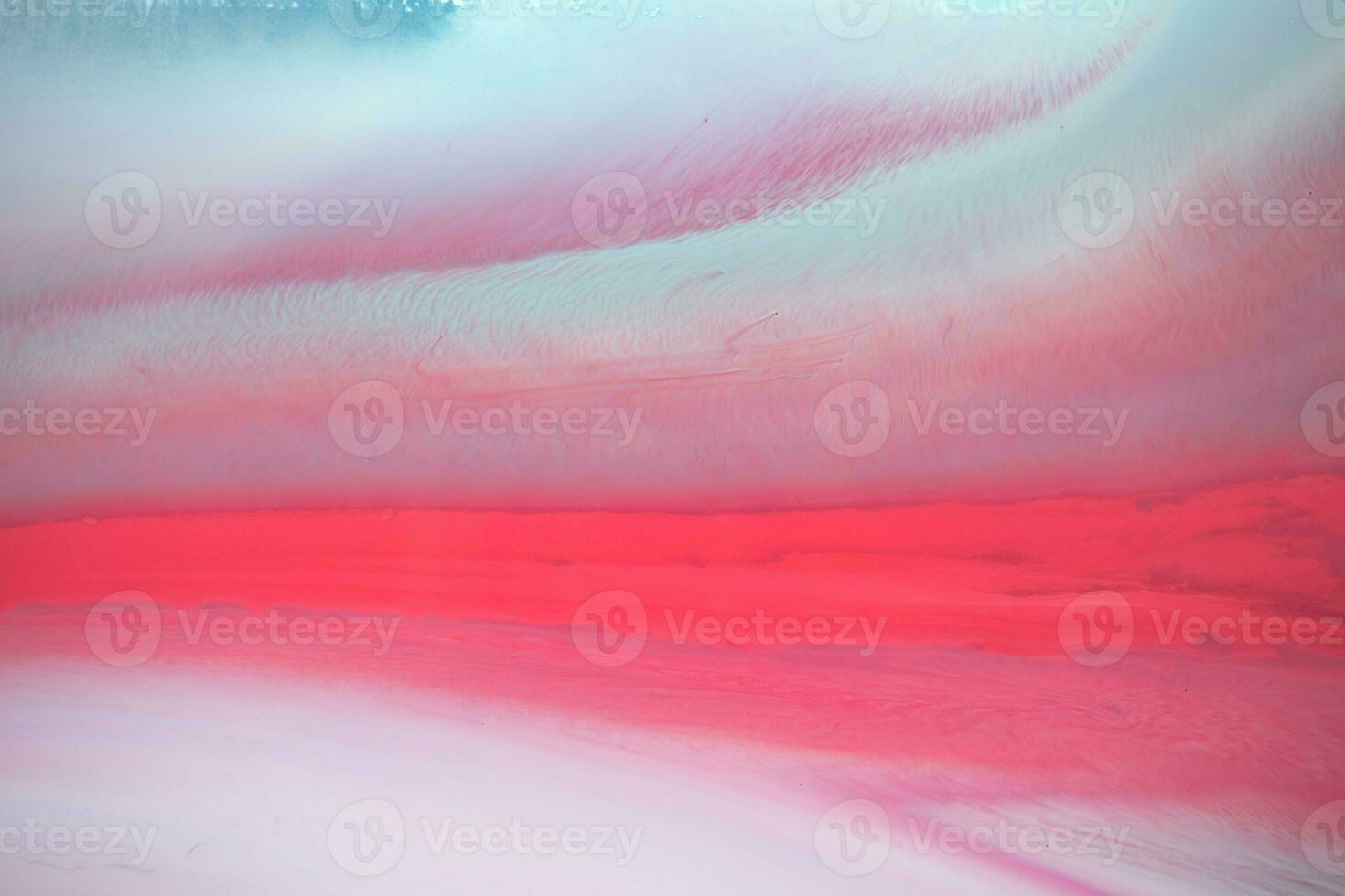 Abstract created using the technique of liquid acrylic. Macro photography of the smallest details of a panting. The panting shows how overflows of shades and colors of paint resemble space motifs. photo