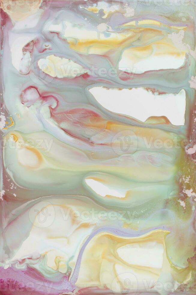 Abstract created using the technique of liquid acrylic. Macro photography of the smallest details of a picture. The picture shows how overflows of shades and colors of paint resemble space motifs. photo