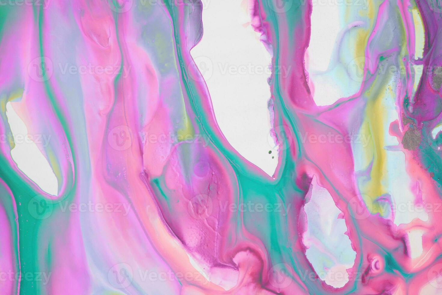 Abstract created using the technique of liquid acrylic. Macro photography of the smallest details of a picture. The picture shows how overflows of shades and colors of paint resemble space motifs. photo
