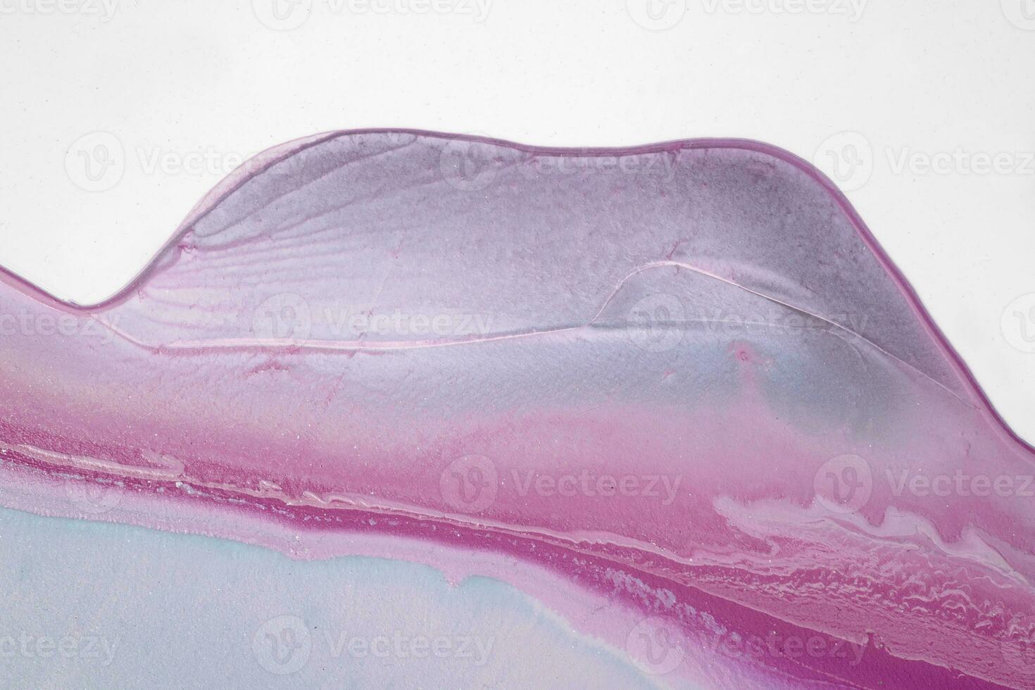 Abstract created using the technique of liquid acrylic. Macro photography of the smallest details of a picture. The picture shows how overflows of shades and colors of paint resemble space motifs. photo