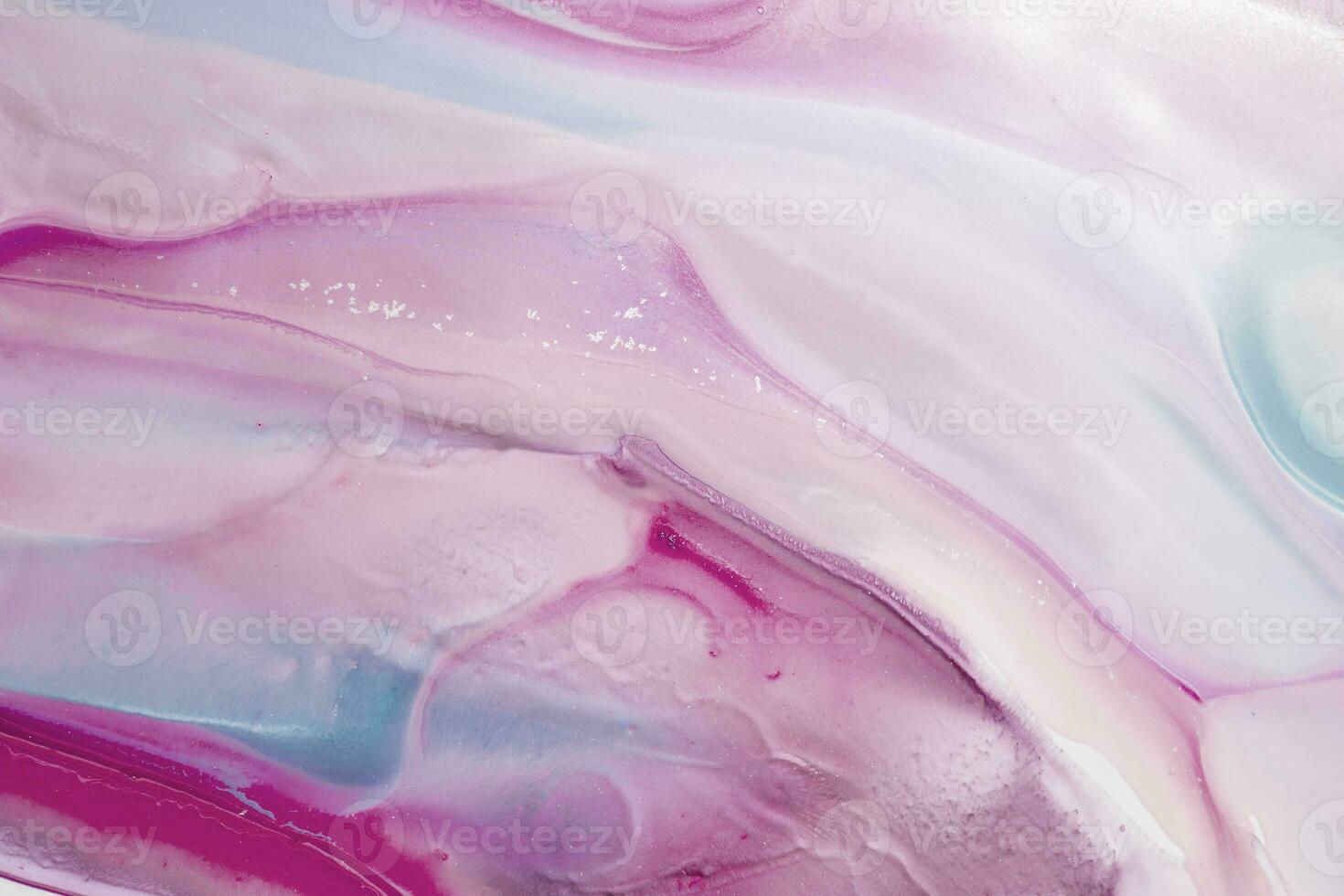 Abstract created using the technique of liquid acrylic. Macro photography of the smallest details of a picture. The picture shows how overflows of shades and colors of paint resemble space motifs. photo