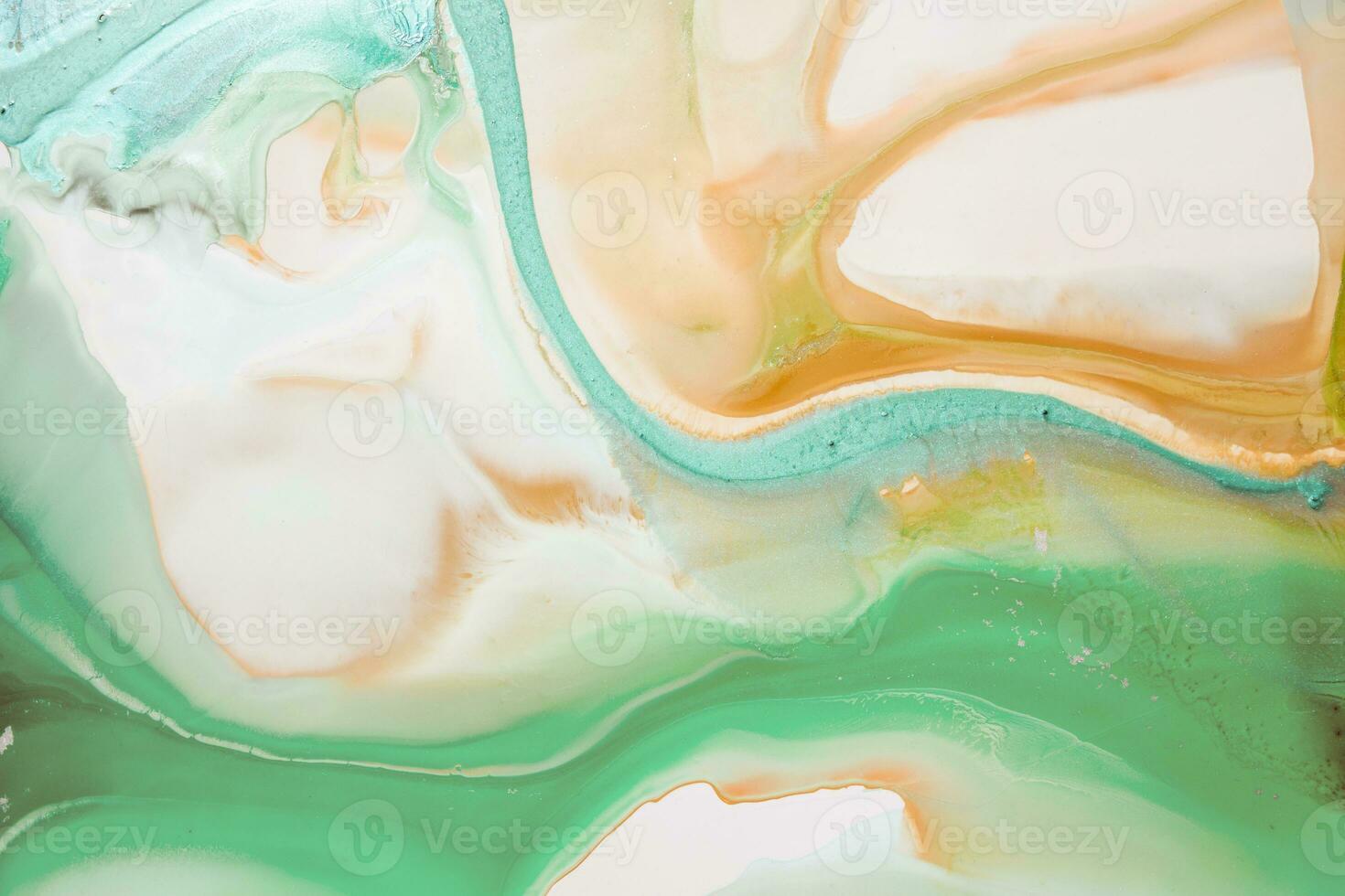 Abstract created using the technique of liquid acrylic. Macro photography of the smallest details of a picture. The picture shows how overflows of shades and colors of paint resemble space motifs. photo