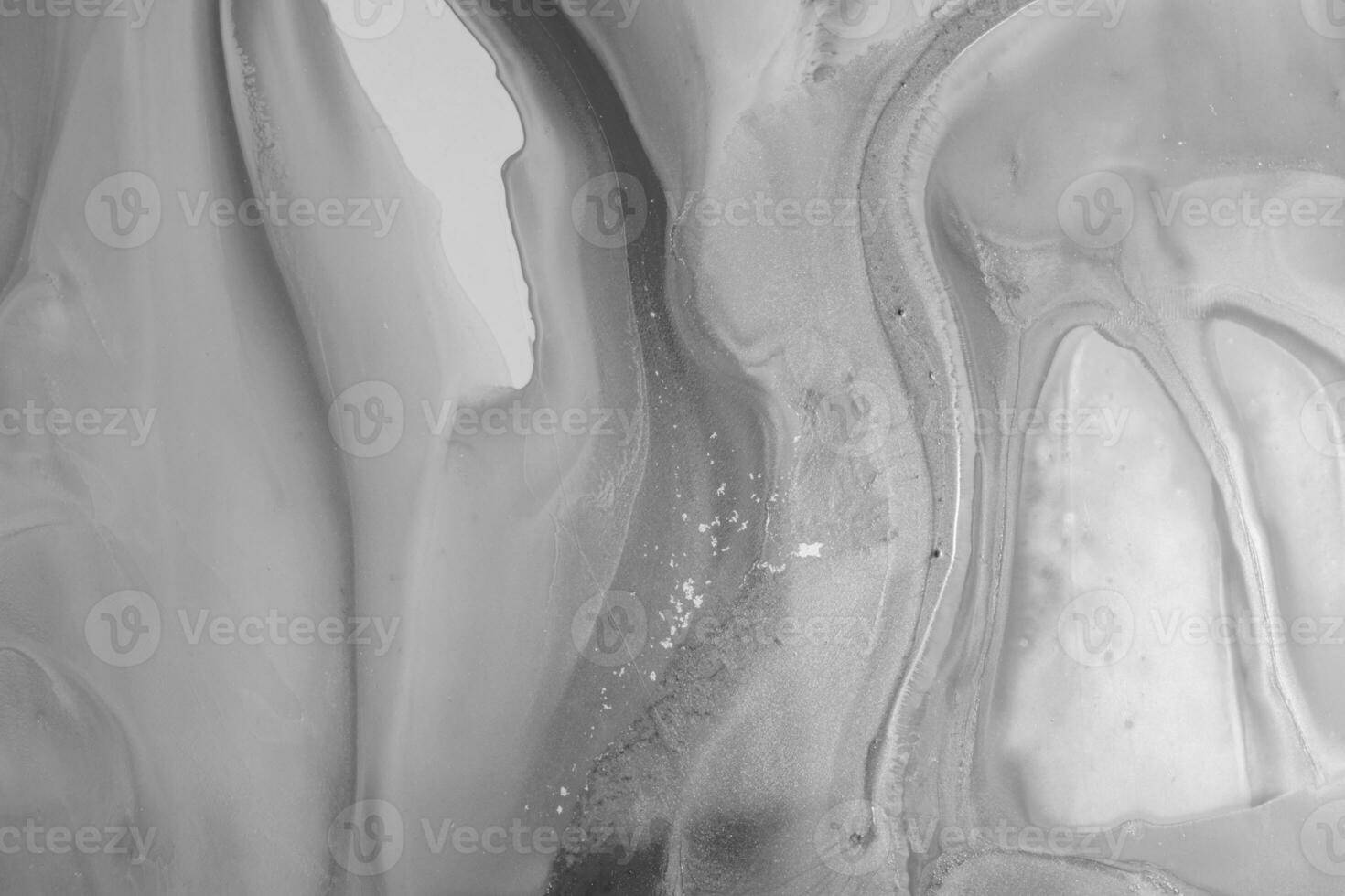 Abstract created using the technique of liquid acrylic. Macro photography of the smallest details of a picture. The picture shows how overflows of shades and colors of paint resemble space motifs. photo