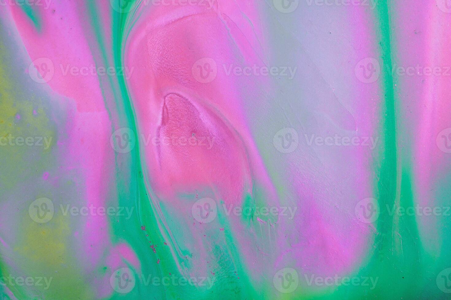 Abstract created using the technique of liquid acrylic. Macro photography of the smallest details of a picture. The picture shows how overflows of shades and colors of paint resemble space motifs. photo