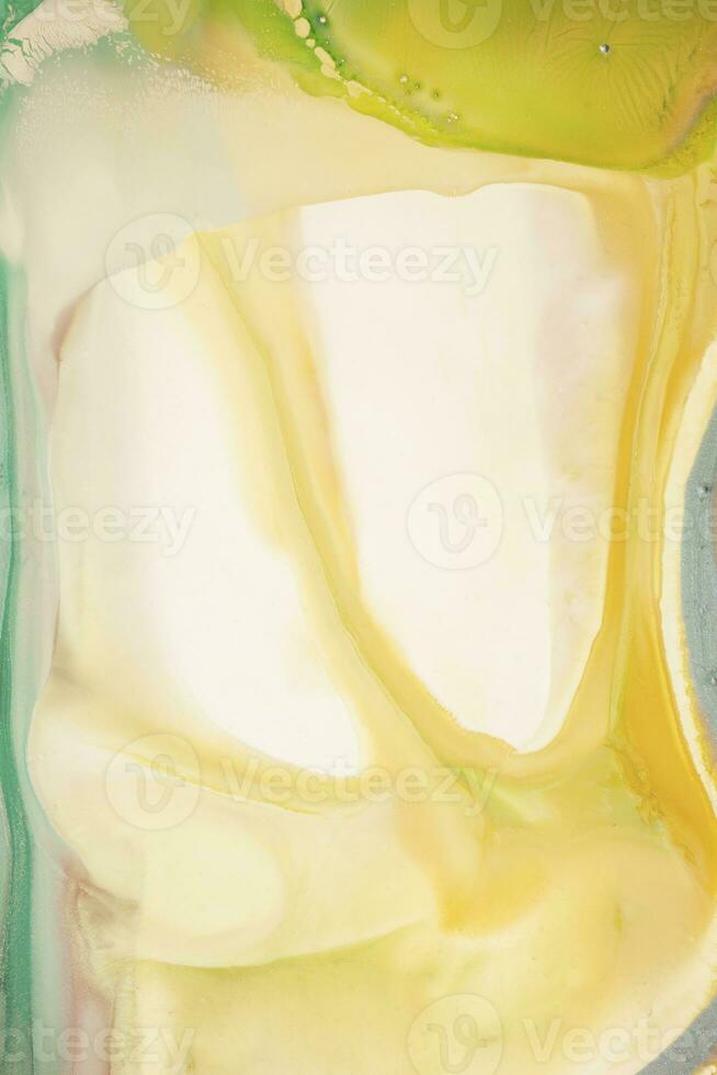 Abstract created using the technique of liquid acrylic. Macro photography of the smallest details of a picture. The picture shows how overflows of shades and colors of paint resemble space motifs. photo