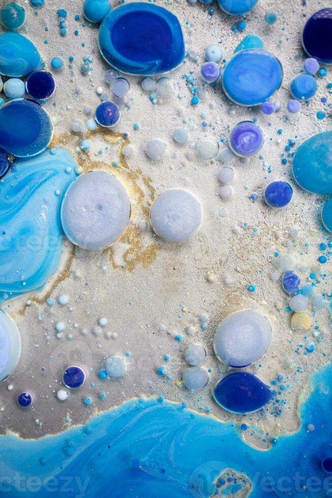 Acrylic paint balls abstract texture. Bright colors fluid, flowing