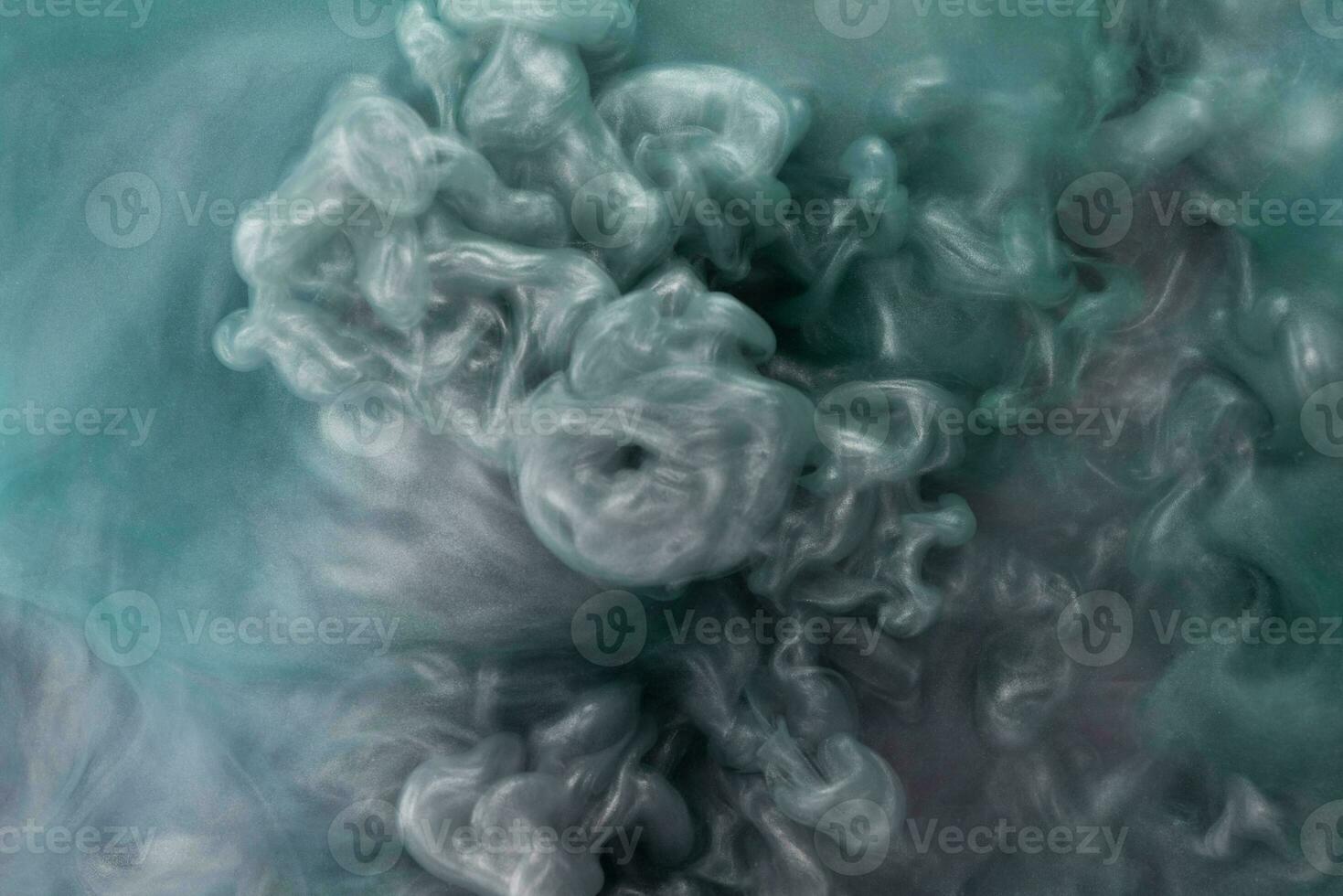 Abstract fluid acrylic painting. Marbled pink abstract Ink cloud on black background. Liquid marble pattern. Modern art. photo