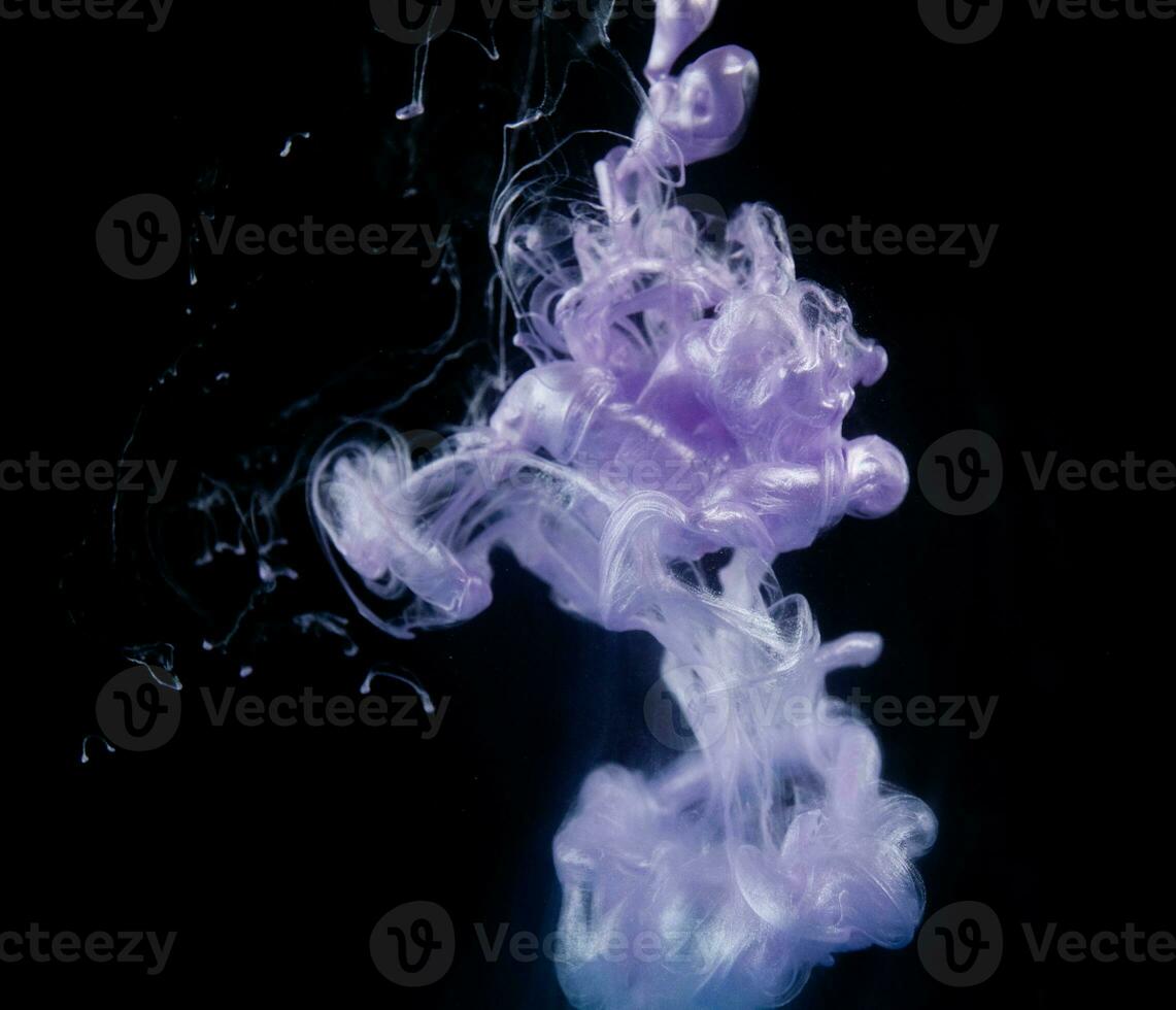 Abstract fluid acrylic painting. Marbled pink abstract Ink cloud on black background. Liquid marble pattern. Modern art. photo