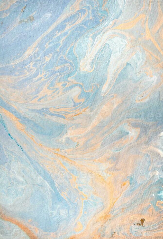 Abstract fluid acrylic painting. Marbled blue abstract background. Liquid marble pattern. Hand painted background with mixed liquid red, blue and green paints. Modern art. photo