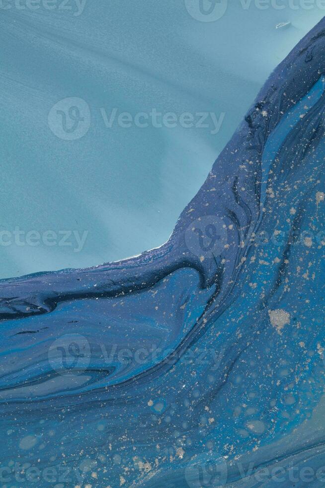 Alcohol ink. Style incorporates the swirls of marble or the ripples of agate. Abstract painting, can be used as a trendy background for wallpapers, posters, cards, invitations, websites. photo