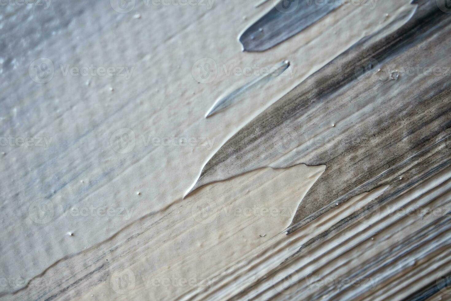 Black, gray and bronze oil painted abstract curves. Texture of brush strokes on white background. Horizontal brush layer, colorful backdrop. photo