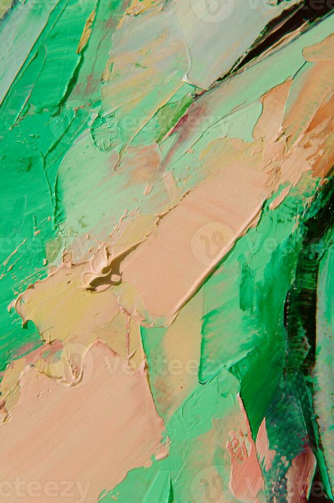 Multicolored texture painting. Abstract art background. oil on canvas. Rough brushstrokes of paint. Closeup of a painting by oil and palette knife. Highly-textured, high quality details. photo