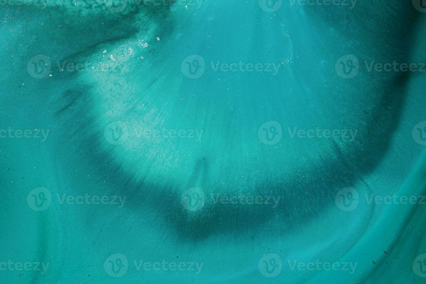 Abstract created using the technique of liquid acrylic. Macro photography of the smallest details of a picture. The picture shows how overflows of shades and colors of paint resemble space motifs. photo