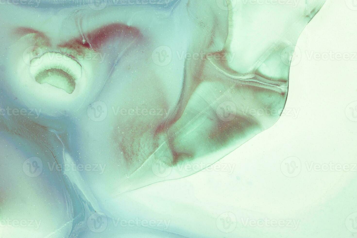 Abstract created using the technique of liquid acrylic. Macro photography of the smallest details of a picture. The picture shows how overflows of shades and colors of paint resemble space motifs. photo