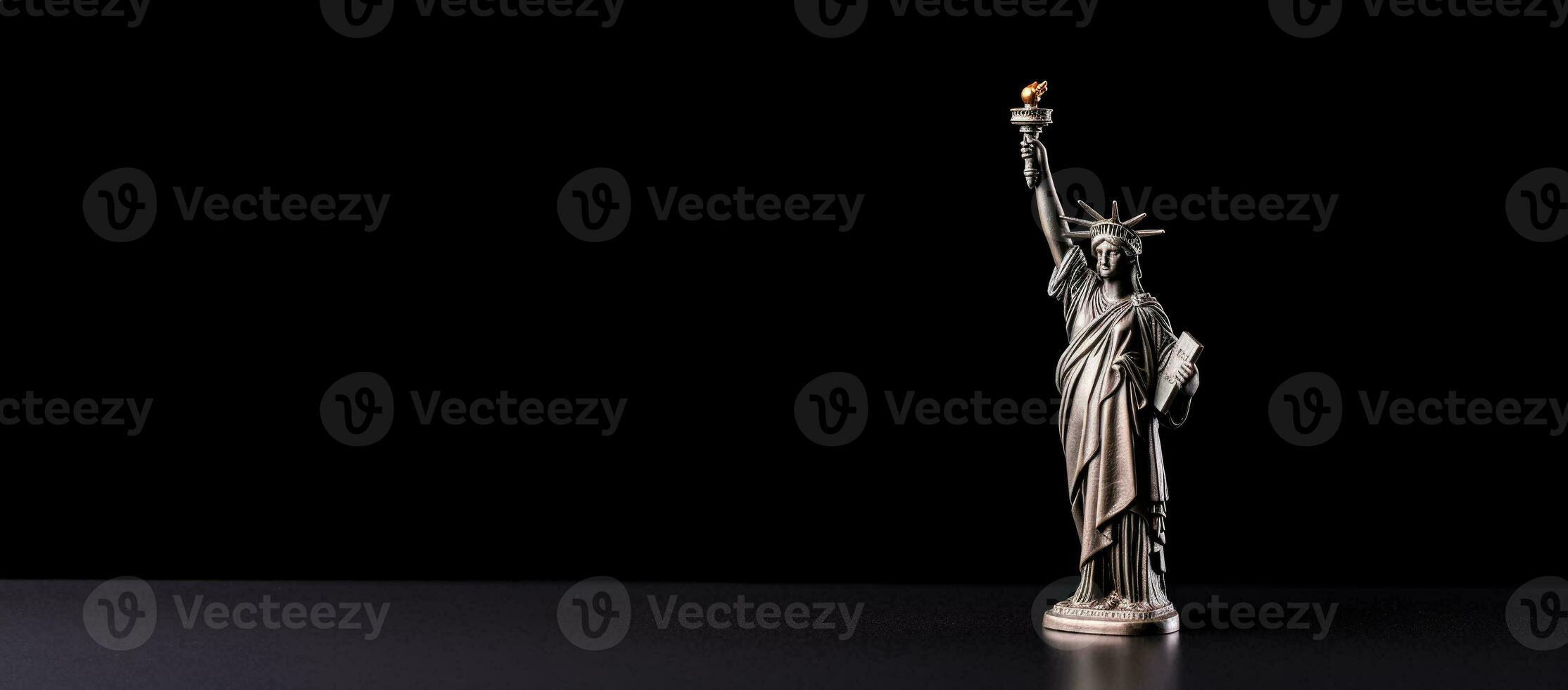 Statue of Liberty figurine symbolizing hope isolated on a white background photo