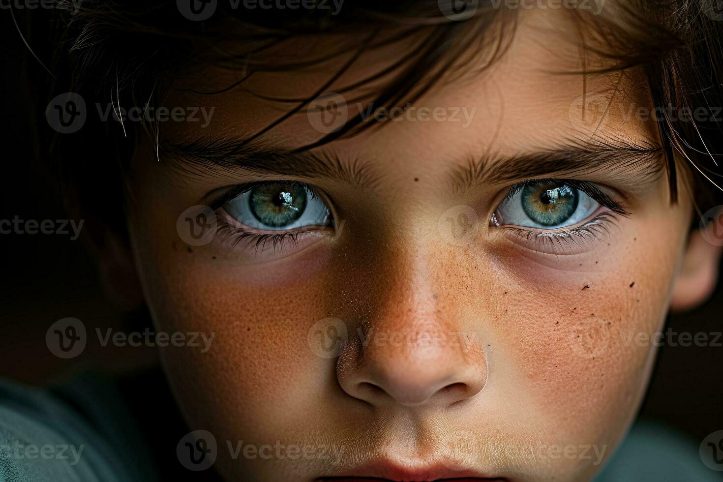 Young eyes gazing forward intense with both hope and apprehension photo