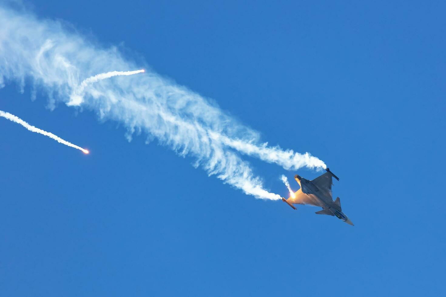 Hungarian Air Force SAAB JAS 39 Gripen fighter jet plane flying. Aviation and military aircraft. photo